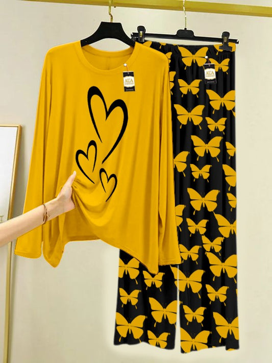 Yellow Multi Heart Printed Nightwear Set With Black Butterfly Printed Trousers – Women's Lounge Wear (007)ging at home, lazy weekends, or catching up on your beauty sleep in style